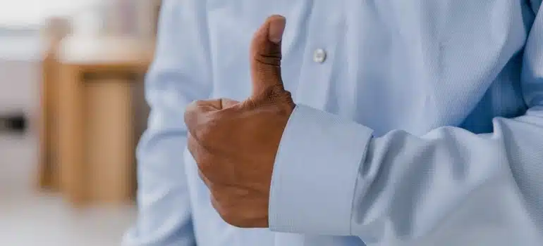 man holding a thumb up