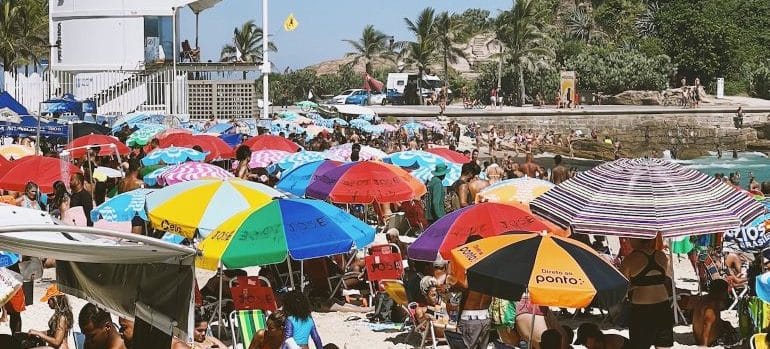 a beach crowded with people