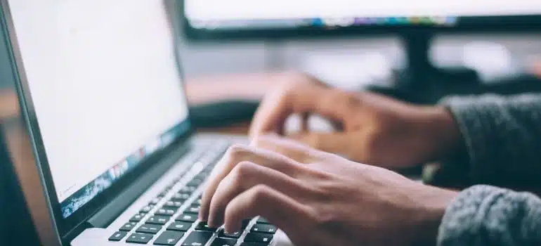 A person using a MacBook Pro