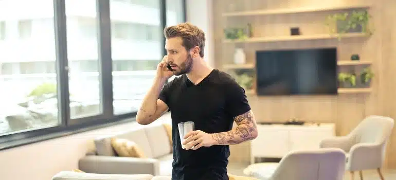 A young man has a phone call