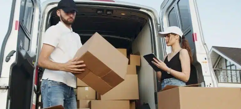 movers packing a truck