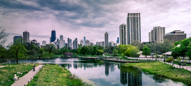 A photo of a park on the river with cityscape made to discover the vibrant lifestyle of brickell