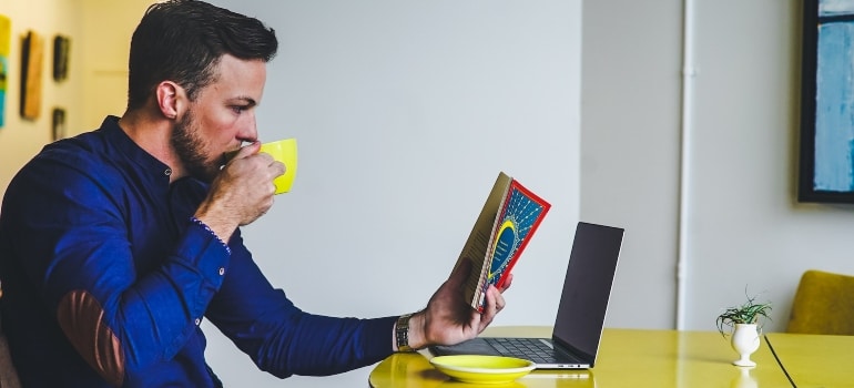 Man looking for a job on his laptop