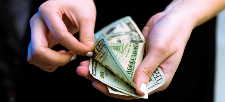 a woman counting money