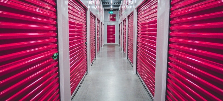 Purple shutter doors inside a storage facility 