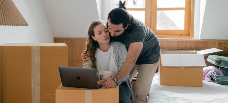 A couple creating a green moving checklist