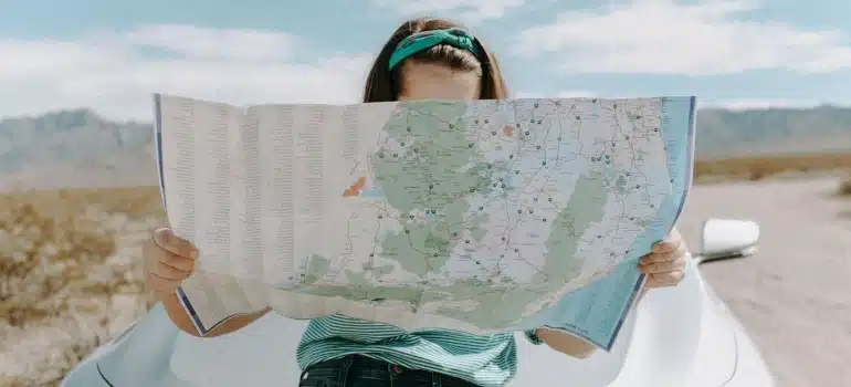 A woman looking at a map
