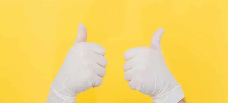 white gloves on a yellow background