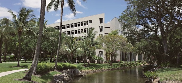 University Campus with Lush Greenery and Canal in Coral Gables, Florida