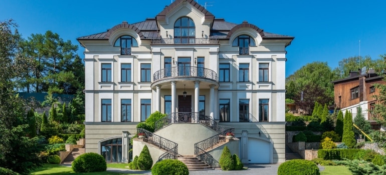 A mansion surrounded by greenery