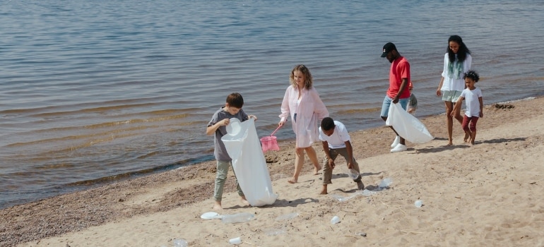 family at the beach as one of the things to do in Hallandale Beach with kids