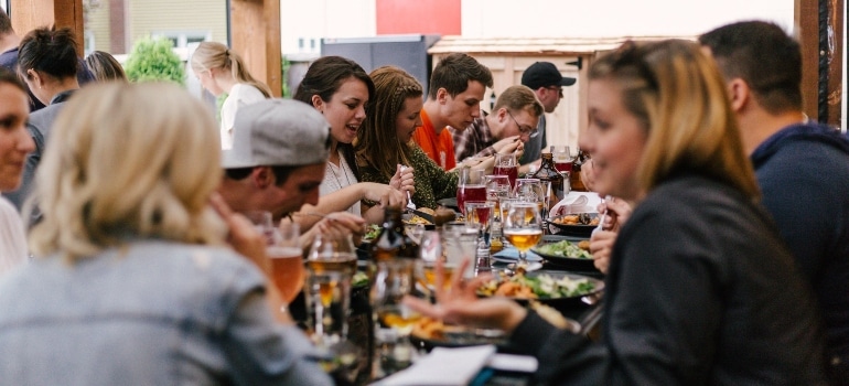 People on a food tour as one of the fun things to do in Coral Gables