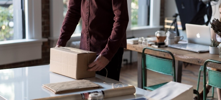 a man about to unpack and arrange your office 