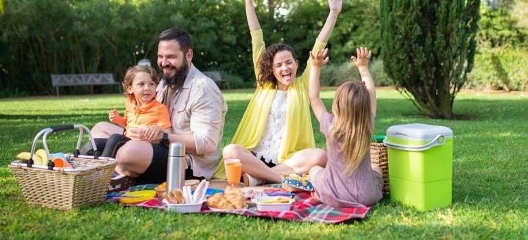 A family having a picnic - one of the fun things to do in Sunny Isles Beach