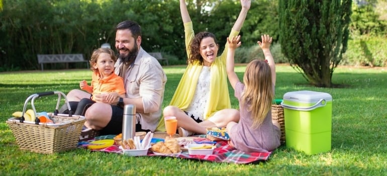 A family having a picnic - one of the fun things to do in Sunny Isles Beach