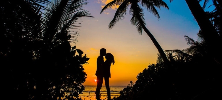 Silhouette of Man and Woman Kissing