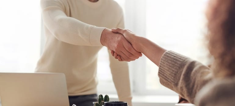 two people shaking hands