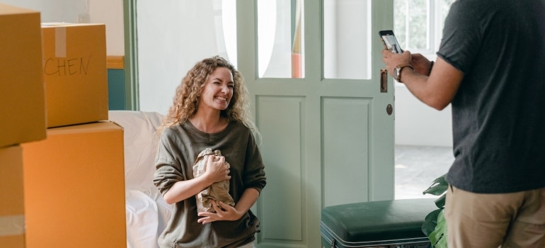 a couple in a new home after making a decision to buy real estate in Coconut Grove