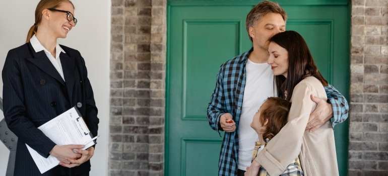 a family with a real estate agents buying a condo in Hollywood F: