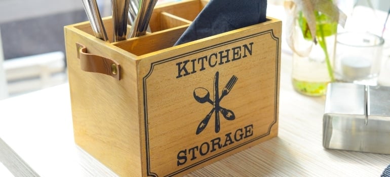 a kitchen storage box ready to be packed after using commercial moving services