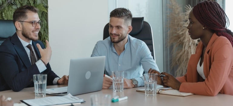 hotel managers discussing about moving a hotel in Miami