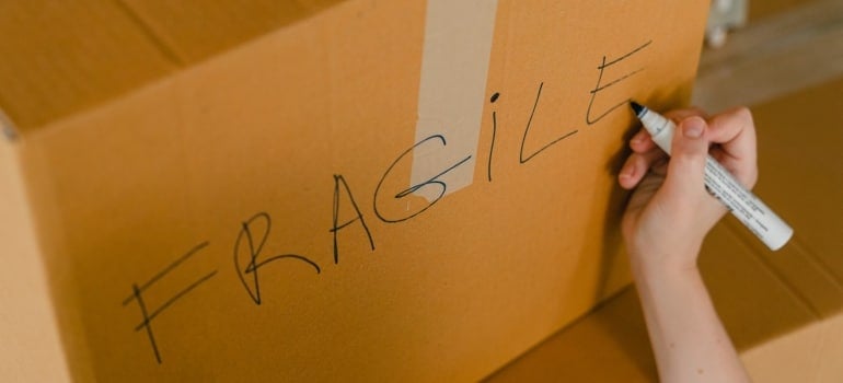 a box labeled fragile is a must when you pack antique chadeliers when moving to Fort Lauderdale