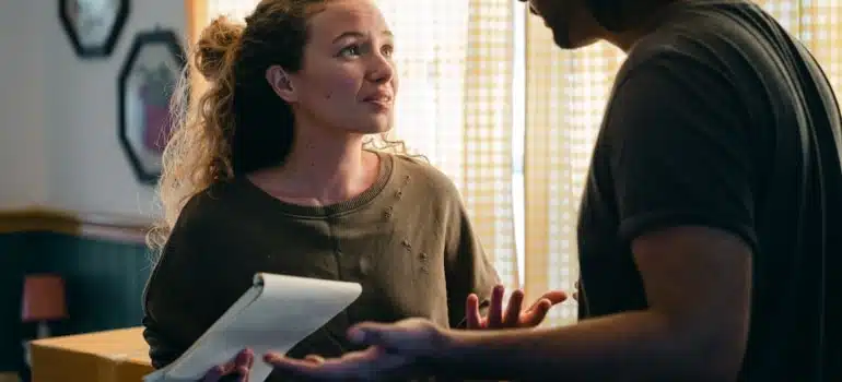 a couple discussing whether tohire movers even if you are moving locally in Hollywood 