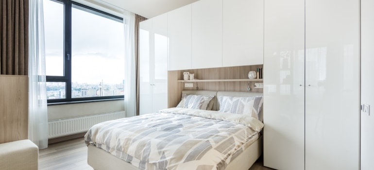 built-in shelves and wardrobe - one of the best space-saving ideas for small bedrooms