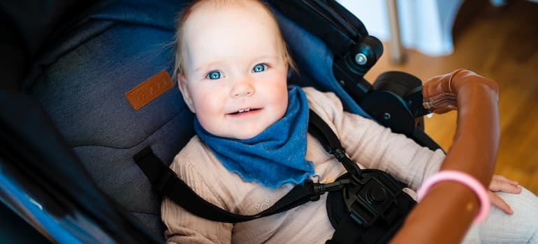 baby sitting in a carseat