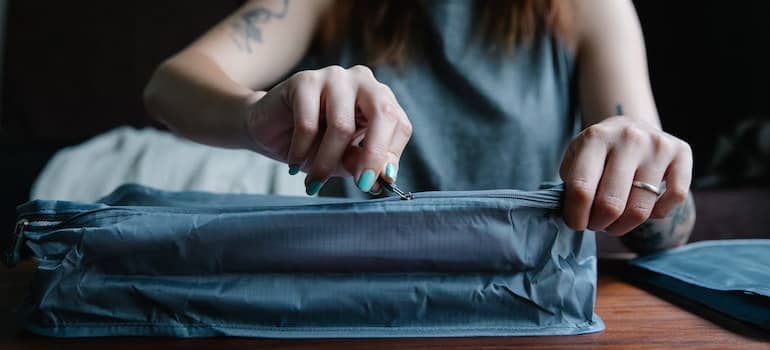 mother preparing an essentials bag for moving to Surfside