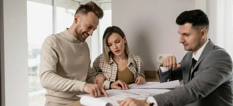 a family with a real estate agent