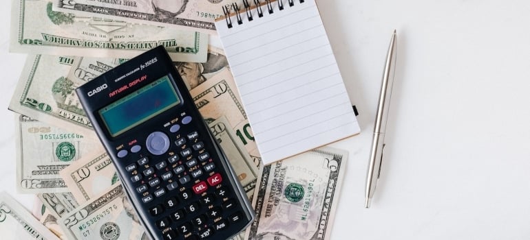 calculator, money, paper needed to consider factors that affect moving costs