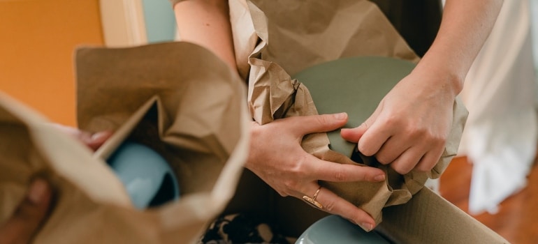 a couple packing delicate items