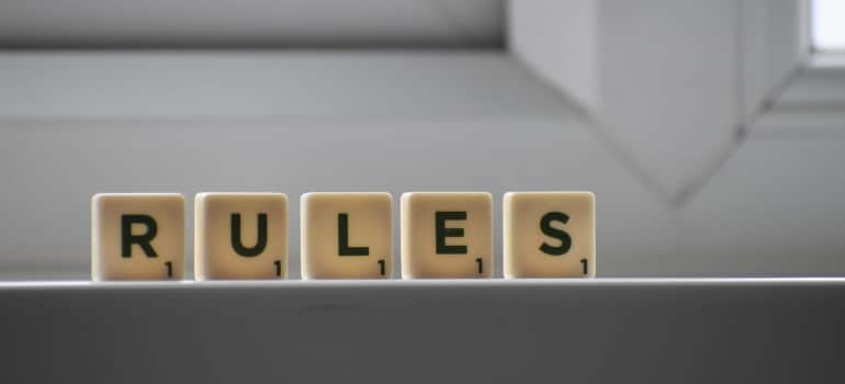 cubes with rules written on them
