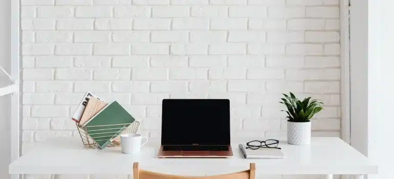 a desk and a laptop on it