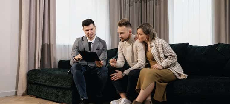 three people talking about South Beach FL real estate options to consider before the move