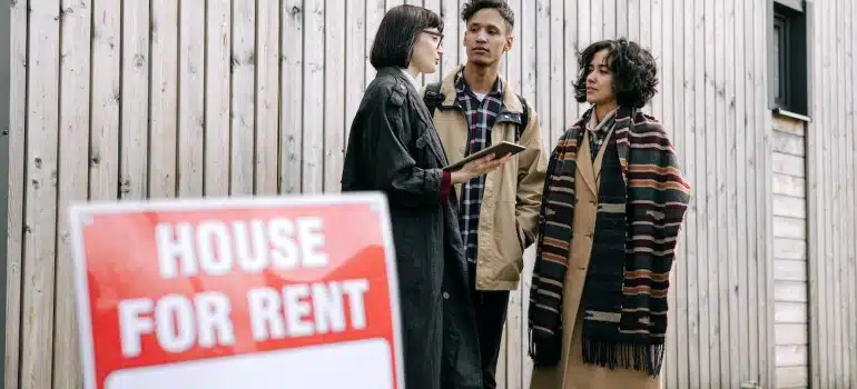 a family with areal estate agent, considering the pros and cons of investing in rental property in Coconut Grove 