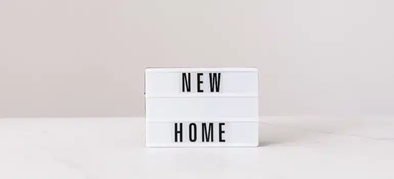 light box with 'new home' inscription