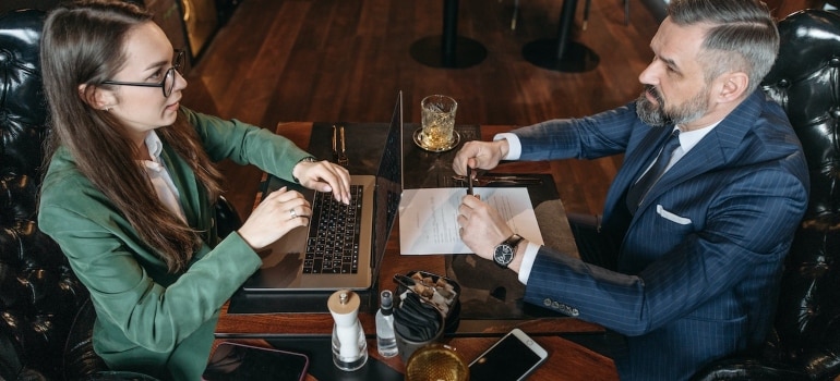 hotel managers discussing about what to do with hotel furniture when renovating?