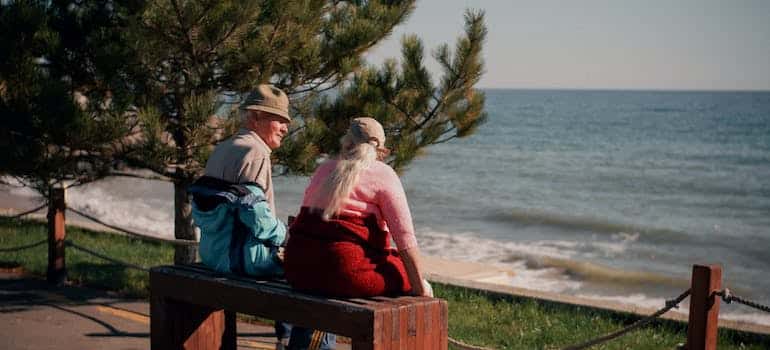 two seniors relaxing after researching the best places to retire in Broward County