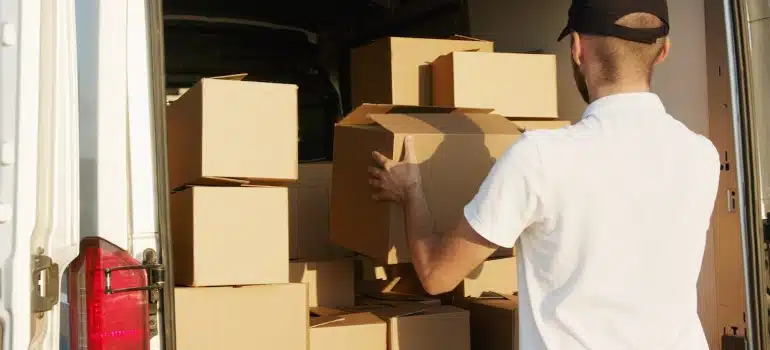 a mover loading a moving van