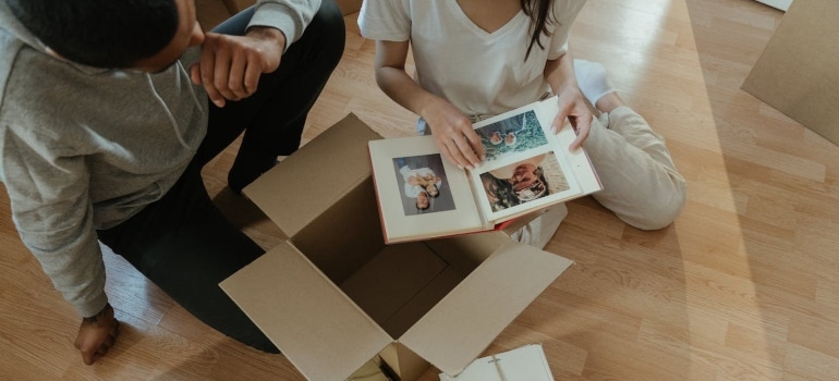 a couple unpacking their memories