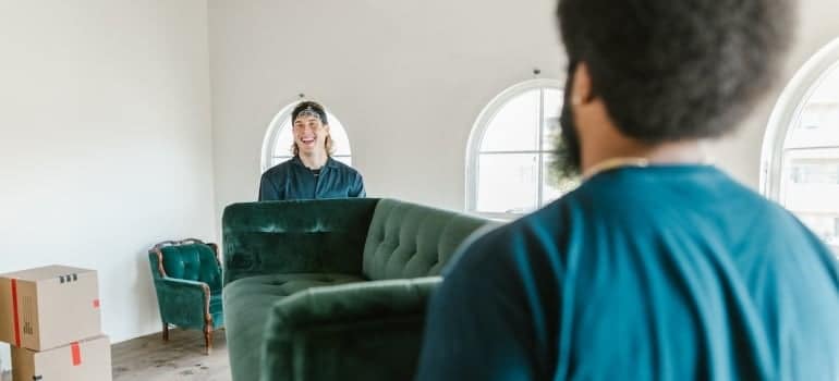 movers lifting a sofa