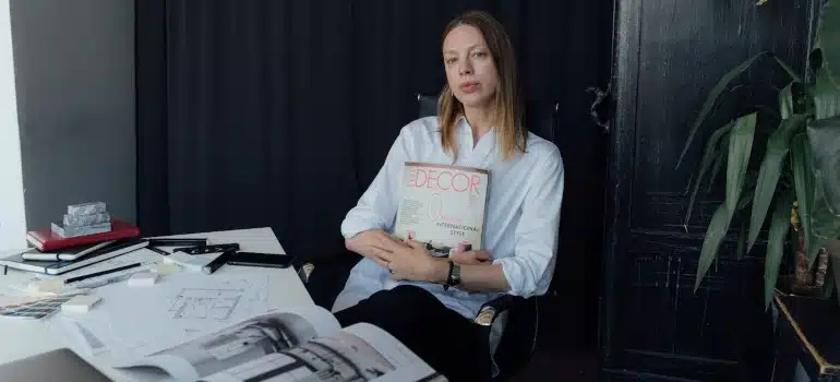 a woman in her office thinking about the best places in Miami Dade County for your business
