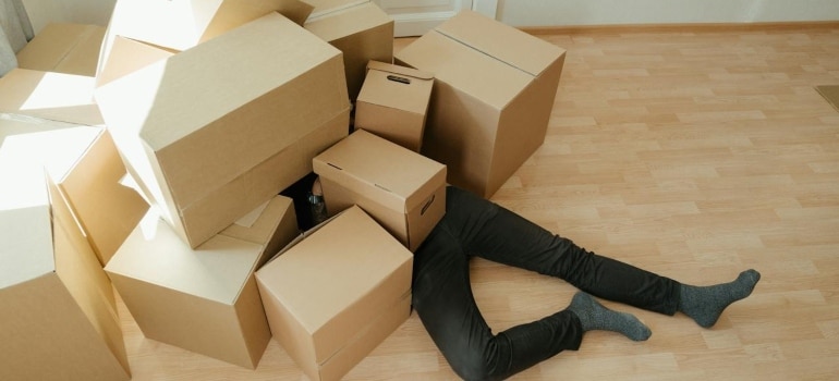 a man under the boxes 