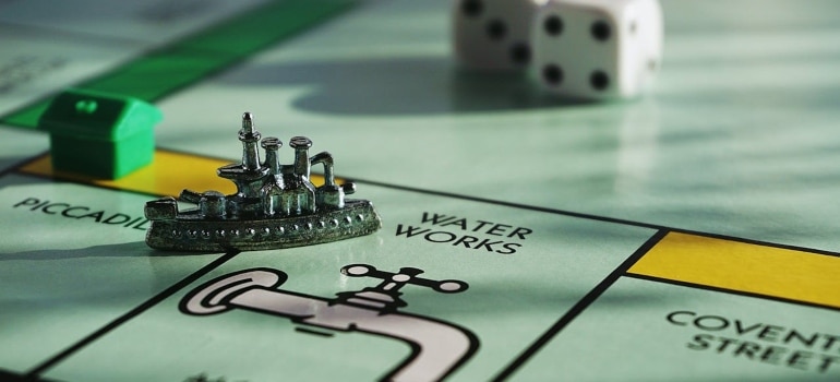 A closeup of a Monopoly game and dice