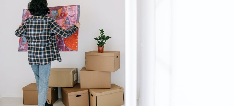 a person with boxes after moving from Coral Gables to Marathon