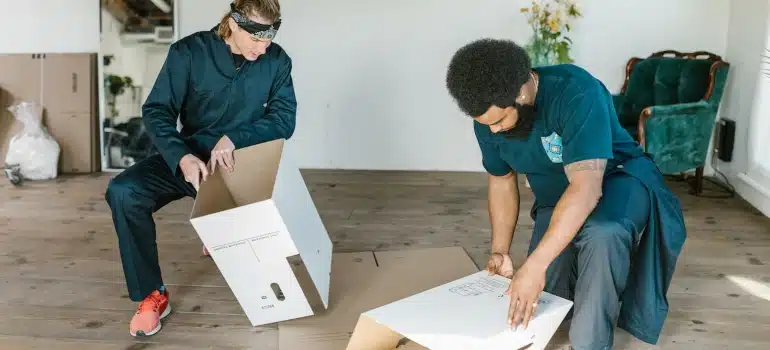 movers making boxes