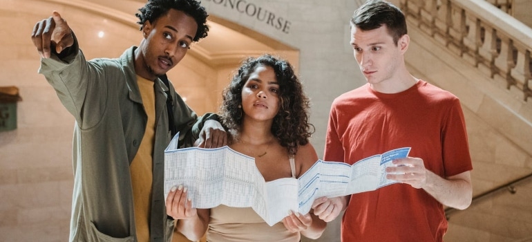 Three students are touring one of the best colleges in Miami