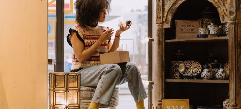 a woman in an antique shop